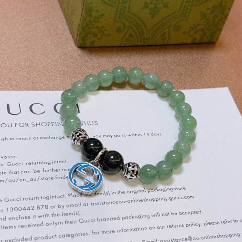 G*u*i bracelets